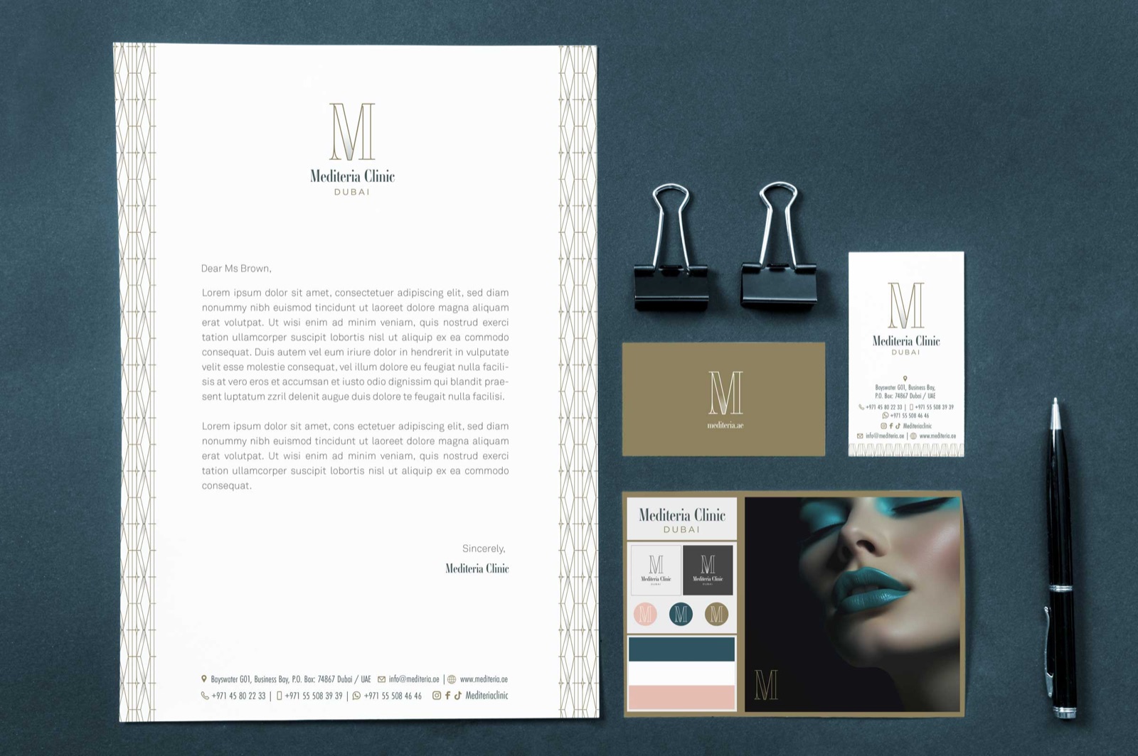 Mediteria Clinic stationery: letterhead, cards and folder on deep teal