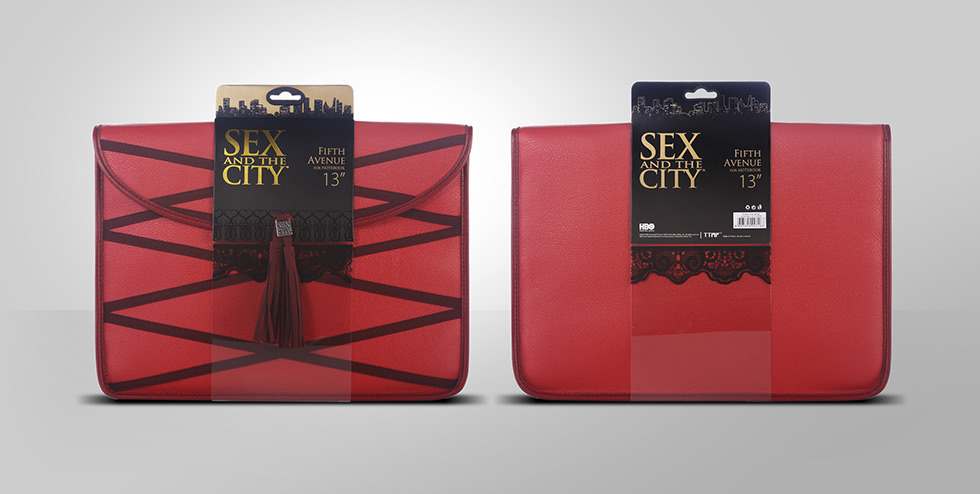 Two red bags, one with the gold header card and one with the black