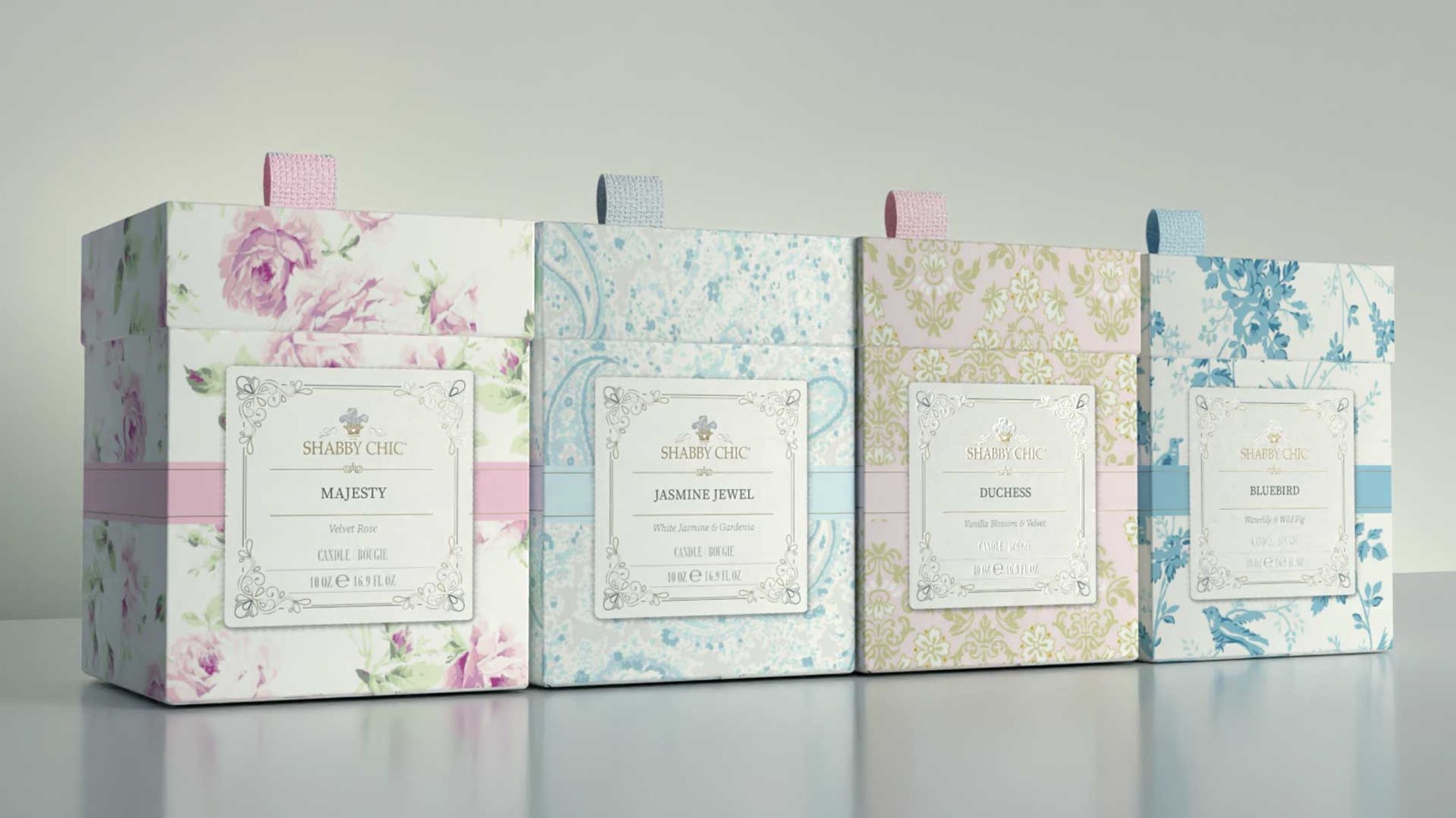 Four Shabby Chic gift boxes, one per scent, each with a ribbon pull tab and a framed label